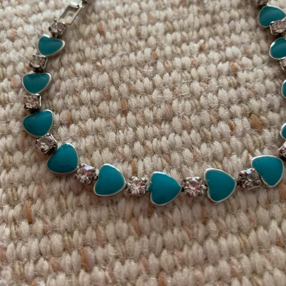 Turquoise heart bracelet.